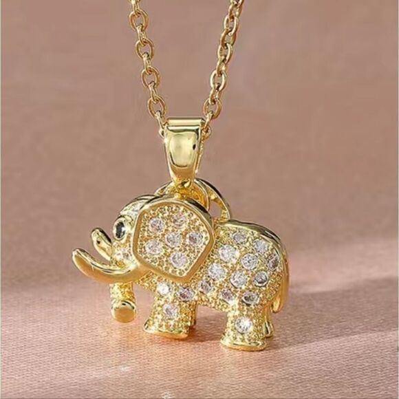 Stainless Steel Elephant Pendant Necklace in Gold Tones and embedded Zirconia - Picture 2 of 11